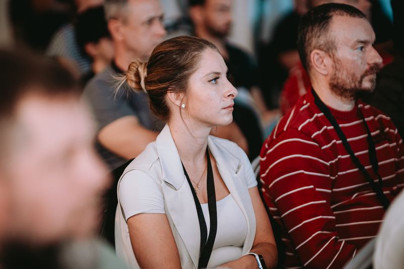 Traders listening to a talk