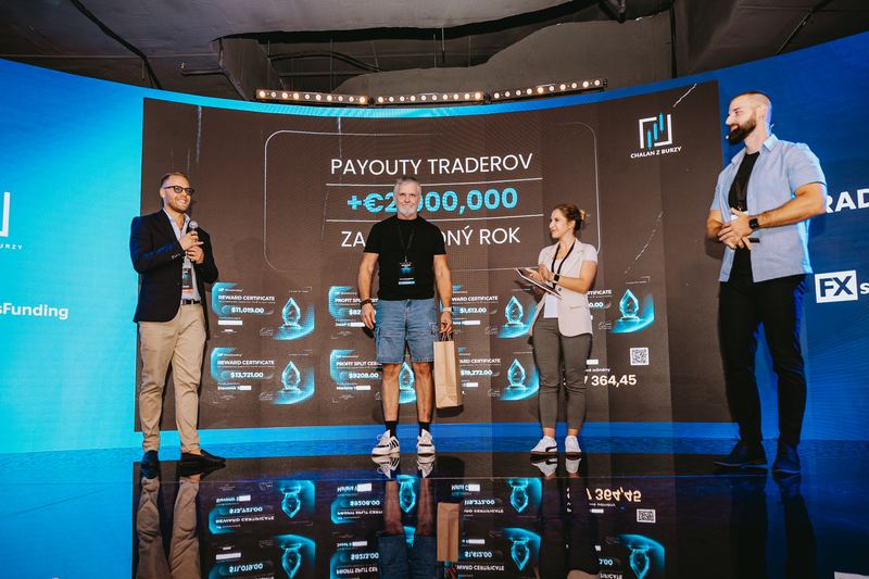 Trader payouts presented on stage